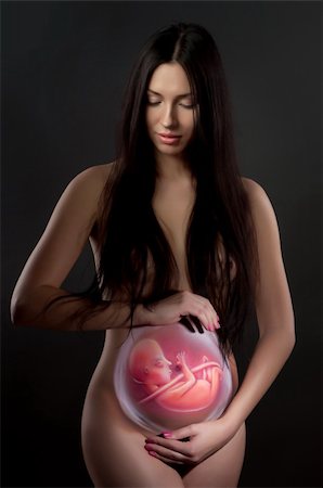pregnancy nude - peinture de corps de la femme enceinte et du fœtus Photographie de stock - Aubaine LD & Abonnement, Code: 400-06416096