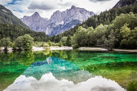 Lake Jasna is a little lake in the Julian Alps near the Vršič Pass road, Slovenia. Stock Photo - Budget Royalty-Free & Subscription, Code: 400-06416697