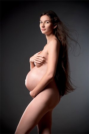 pregnancy nude - femme enceinte nue avec très longs cheveux bruns Photographie de stock - Aubaine LD & Abonnement, Code: 400-06418093