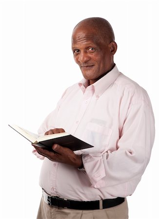 evangelist - A senior person holds a holy or text book in his hands. Stock Photo - Budget Royalty-Free & Subscription, Code: 400-06418226
