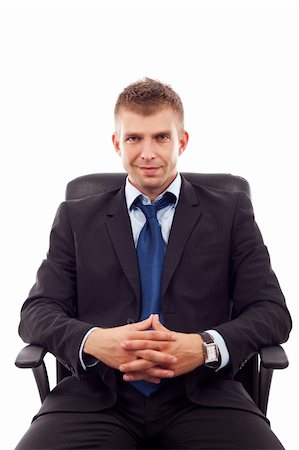 handsome business man sitting in office chair over white Stock Photo - Budget Royalty-Free & Subscription, Code: 400-06419128