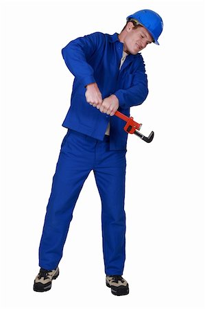 Plumber using a pipe wrench Stock Photo - Budget Royalty-Free & Subscription, Code: 400-06424533