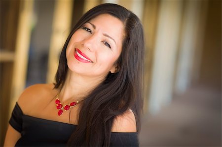 Attractive Smiling Hispanic Woman Portrait Outside. Stock Photo - Budget Royalty-Free & Subscription, Code: 400-06425425