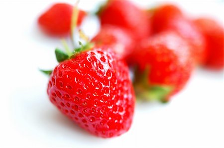 simsearch:400-05370991,k - Macro view of Strawberry fruits on a white background Stock Photo - Budget Royalty-Free & Subscription, Code: 400-06426014