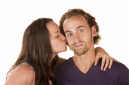 simsearch:400-06396543,k - Calm bearded man kissed by woman over isolated background Stock Photo - Budget Royalty-Free & Subscription, Code: 400-06428048