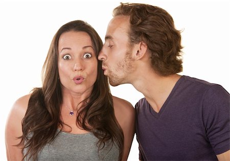 simsearch:400-06396543,k - Astonished Caucasian woman kissed on cheek by man Stock Photo - Budget Royalty-Free & Subscription, Code: 400-06428049