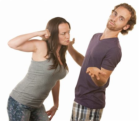 simsearch:400-06363059,k - Suspicious woman threatening man with her fist Stock Photo - Budget Royalty-Free & Subscription, Code: 400-06428054