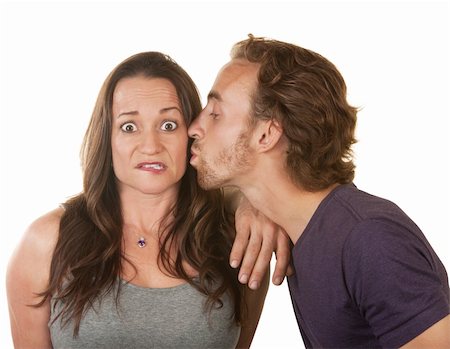 simsearch:400-06396543,k - Surprised woman being kissed by bearded white man Stock Photo - Budget Royalty-Free & Subscription, Code: 400-06428050