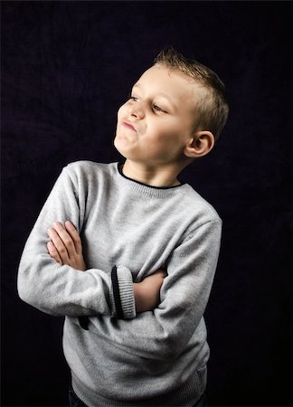 simsearch:695-03380694,k - Little boy with a facial expression Stock Photo - Budget Royalty-Free & Subscription, Code: 400-06429705