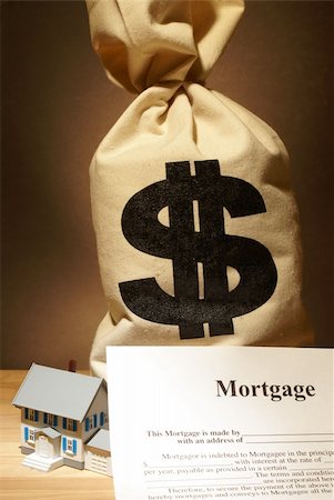 simsearch:400-04408371,k - A bag of money to represent the cost of a housing unit. Stock Photo - Budget Royalty-Free & Subscription, Code: 400-06420549