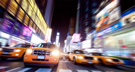 Time Square full of Taxi Cabs in the night Stock Photo - Budget Royalty-Free & Subscription, Code: 400-06421664