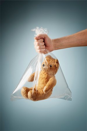 suffocated - Old generic teddybear in a clear plastic bag. Stock Photo - Budget Royalty-Free & Subscription, Code: 400-06423012