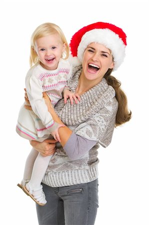 Christmas portrait of happy mother and baby girl Stock Photo - Budget Royalty-Free & Subscription, Code: 400-06464800