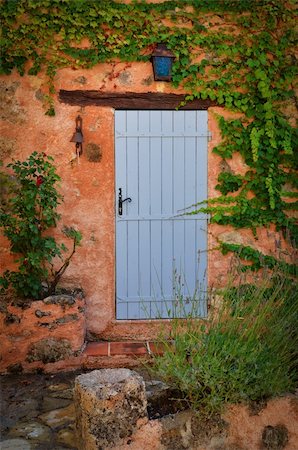 dirty nails - Old blue entrance door in orange wall, Provence, France Stock Photo - Budget Royalty-Free & Subscription, Code: 400-06475769