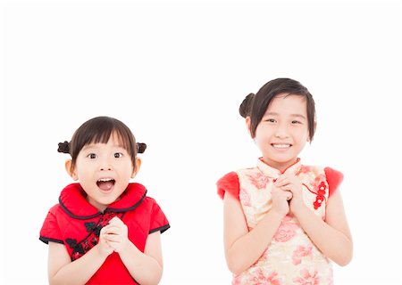 happy chinese new year. two asian girls with Congratulation gesture Stock Photo - Budget Royalty-Free & Subscription, Code: 400-06479197