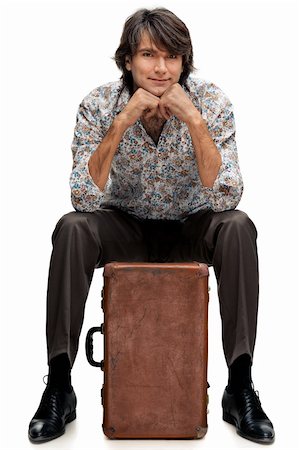 portrait of man with a suitcase on a white background Stock Photo - Budget Royalty-Free & Subscription, Code: 400-06471459