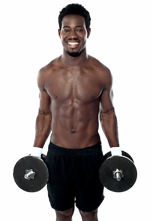 simsearch:400-06482604,k - Attractive man posing with dumbbells isolated against white background Stock Photo - Budget Royalty-Free & Subscription, Code: 400-06481066