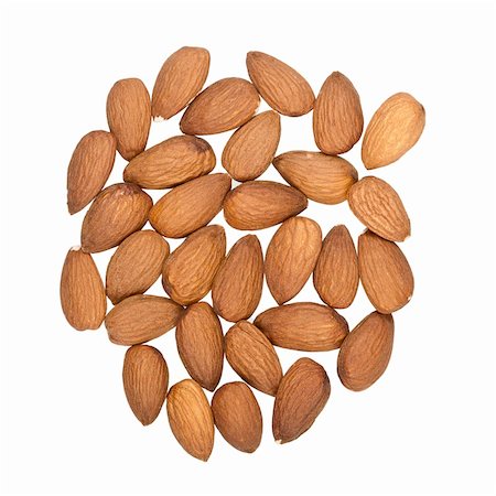 simsearch:400-04833195,k - Pile of almonds isolated on white background Stock Photo - Budget Royalty-Free & Subscription, Code: 400-06481527