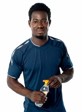 simsearch:400-06482604,k - Fit man posing with water bottle isolated over white background Stock Photo - Budget Royalty-Free & Subscription, Code: 400-06482604