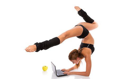 Athletic woman standing in flexible posture and typing on  laptop keyboard, isolated on white. Stock Photo - Budget Royalty-Free & Subscription, Code: 400-06525361