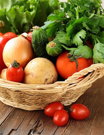 simsearch:400-06864386,k - fresh vegetables and herbs mix in a wicker basket Stock Photo - Budget Royalty-Free & Subscription, Code: 400-06528568