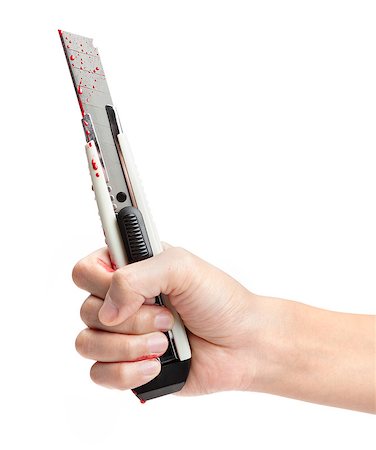 simsearch:400-04807287,k - A hand holding a blood covered boxcutter isolated on a white background. Stock Photo - Budget Royalty-Free & Subscription, Code: 400-06528735