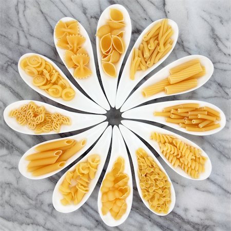 Pasta selection in white porcelain dishes over marble background. Stock Photo - Budget Royalty-Free & Subscription, Code: 400-06520856