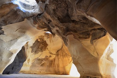 Bell cave at Tel-Maresha - Beit Guvrin National Park. An ancient quarry, dug during Early Arabic period between 7-th and 10-th centuries. Located at the city of Beit Guvrin, which was founded on the ruins of the biblical city of Maresha. Book of Joshua 15:44 Keilah, Achzib, and Mareshah: nine cities with their villages. Stock Photo - Budget Royalty-Free & Subscription, Code: 400-06521280