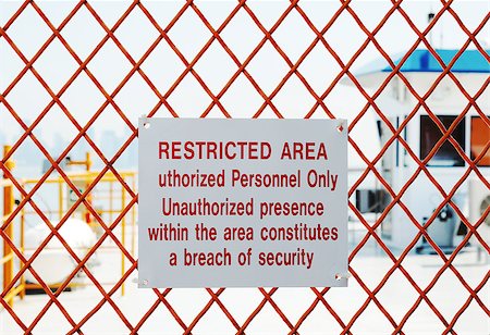 A security sign outside a restricted area Stock Photo - Budget Royalty-Free & Subscription, Code: 400-06530171