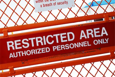 A security sign outside a restricted area Stock Photo - Budget Royalty-Free & Subscription, Code: 400-06530172