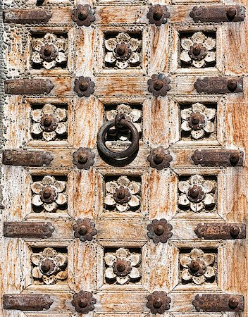 simsearch:400-07257534,k - Old wooden door with floral decoration. Fragment. Rajasthan,India Stock Photo - Budget Royalty-Free & Subscription, Code: 400-06557309