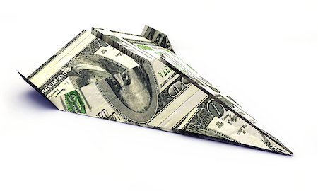 dollar airplane isolated on white background Stock Photo - Budget Royalty-Free & Subscription, Code: 400-06558870