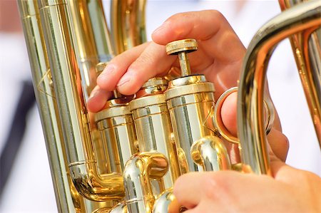 Men playing on a golden  tuba or euphonium Photographie de stock - Aubaine LD & Abonnement, Code: 400-06565155