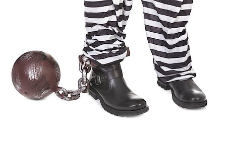 Close-up of prisoners' legs on white background Photographie de stock - Aubaine LD & Abonnement, Code: 400-06565779