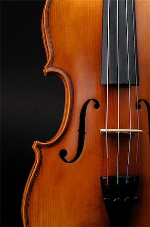 Violin front view on black background cropped closeup Stock Photo - Budget Royalty-Free & Subscription, Code: 400-06566857