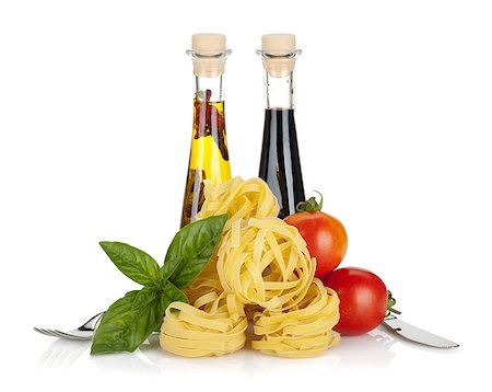 simsearch:400-06796273,k - Italian colors food. Basil, pasta, tomatoes, olive oil and vinegar. Isolated on white background Stock Photo - Budget Royalty-Free & Subscription, Code: 400-06568065