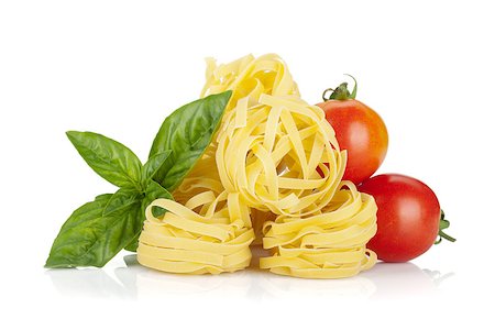 simsearch:400-06796273,k - Italian colors food. Basil, pasta and tomatoes. Isolated on white background Stock Photo - Budget Royalty-Free & Subscription, Code: 400-06568066