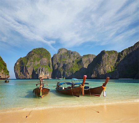 famous nature in asia - Thai traditional boats in the bay. Thailand, Phi Phi Island Stock Photo - Budget Royalty-Free & Subscription, Code: 400-06568259