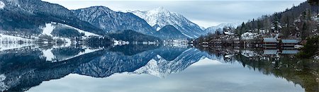snowy austria village - Cloudy winter Alpine  lake Grundlsee panorama (Austria) with fantastic pattern-reflection on the water surface. Stock Photo - Budget Royalty-Free & Subscription, Code: 400-06560479