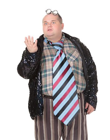 flamboyant - Fun portrait of an obese man with an outrageous fashion sense wearing a mixture of stripes, checks and spangles topped by an oversized flamboyant tie, on white Stock Photo - Budget Royalty-Free & Subscription, Code: 400-06562035
