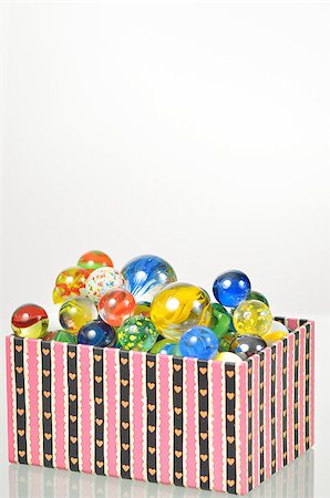 marbles balls in box Stock Photo - Budget Royalty-Free & Subscription, Code: 400-06562290