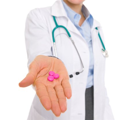 Closeup on medical doctor woman giving pills Stock Photo - Budget Royalty-Free & Subscription, Code: 400-06562815