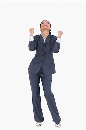 executive standing white background - Cheerful businesswoman against a white background Photographie de stock - Aubaine LD & Abonnement, Code: 400-06627115