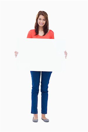 female white background full body - Teenager holding a blank poster while being against a colourless background Stock Photo - Budget Royalty-Free & Subscription, Code: 400-06634612
