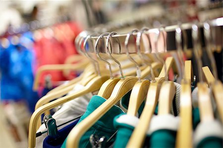 simsearch:400-04739257,k - Hangers in the clothes store. Shallow depth of field. Stock Photo - Budget Royalty-Free & Subscription, Code: 400-06638636