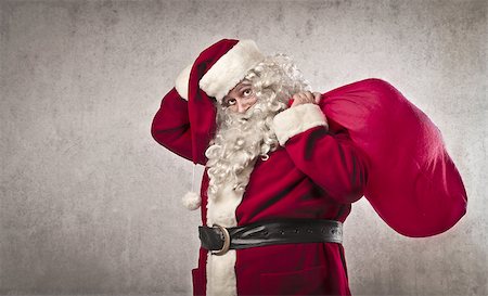 Tired Santa Claus holding his sack Stock Photo - Budget Royalty-Free & Subscription, Code: 400-06639918