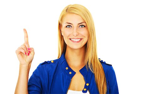 A picture of a young happy woman pointing at something over white background Photographie de stock - Aubaine LD & Abonnement, Code: 400-06630508
