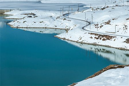 Swiss railway near white lake, Mount Bernina Stock Photo - Budget Royalty-Free & Subscription, Code: 400-06640756