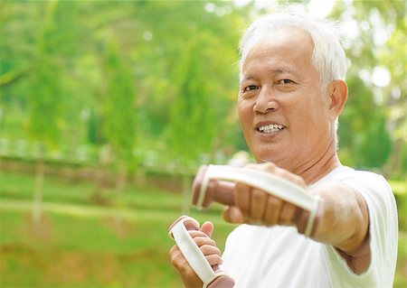 elder workout - Asian senior man healthy lifestyle. Happy Asian grandparent playing sport at outdoor green park. Stock Photo - Budget Royalty-Free & Subscription, Code: 400-06643514