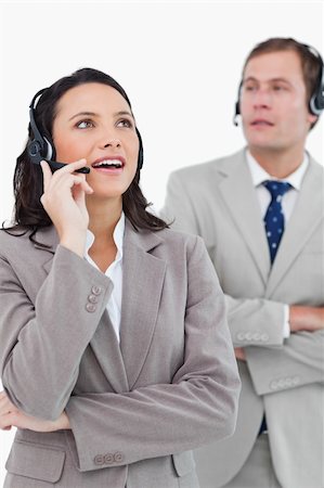 simsearch:400-03933798,k - Call center agents at work against a white background Stock Photo - Budget Royalty-Free & Subscription, Code: 400-06685575